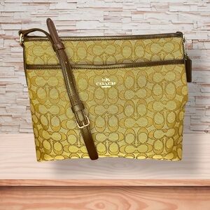 Coach Signature Gold Jacquard File Crossbody Bag with Brown Trim